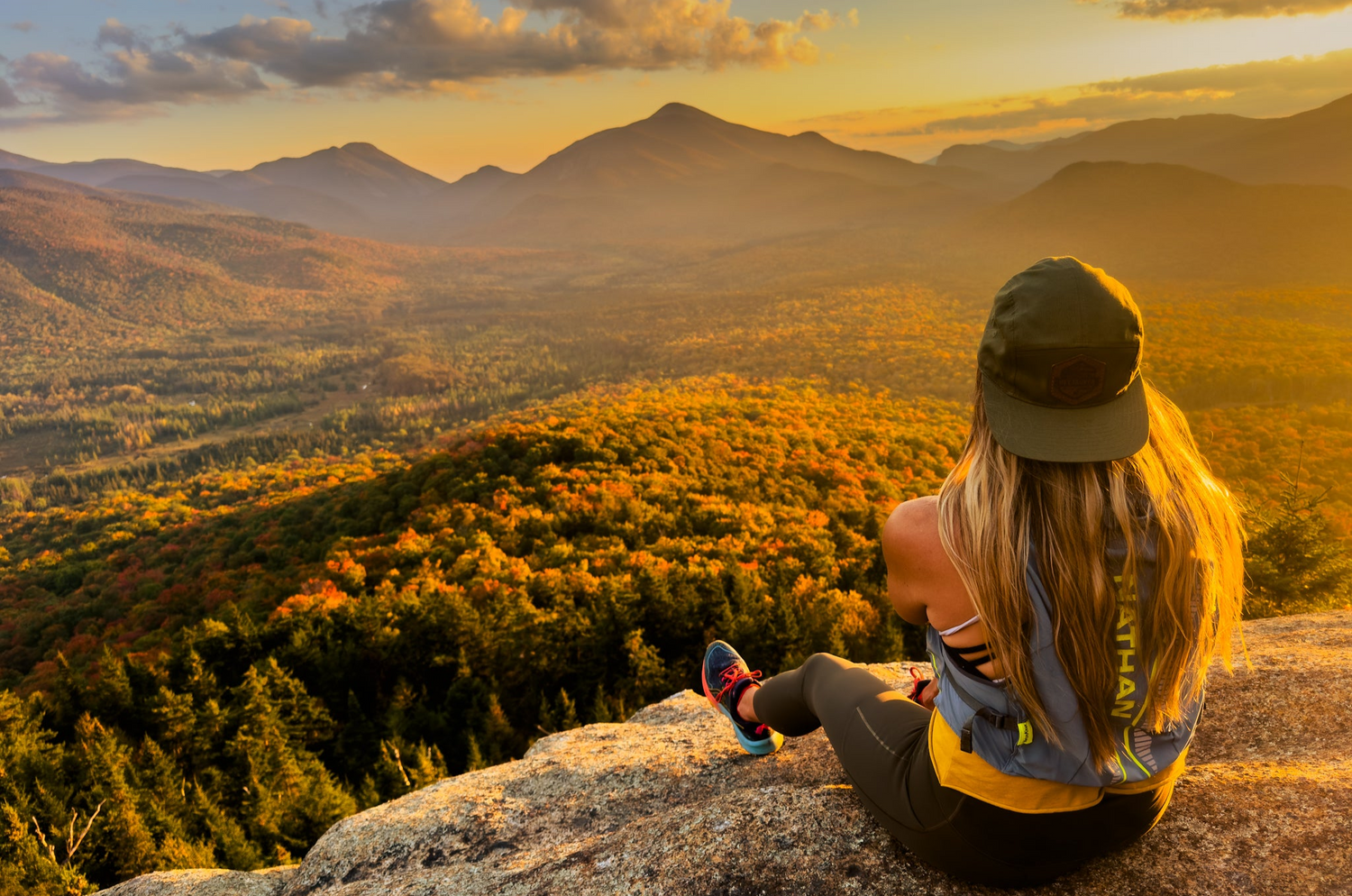 Janet Thomas Master and Elite Trainer on a summit during a trail run in the Adirondack Mountains