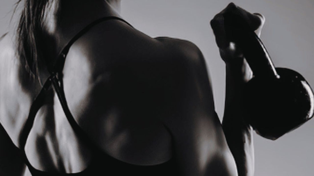 Woman holding a kettlebell