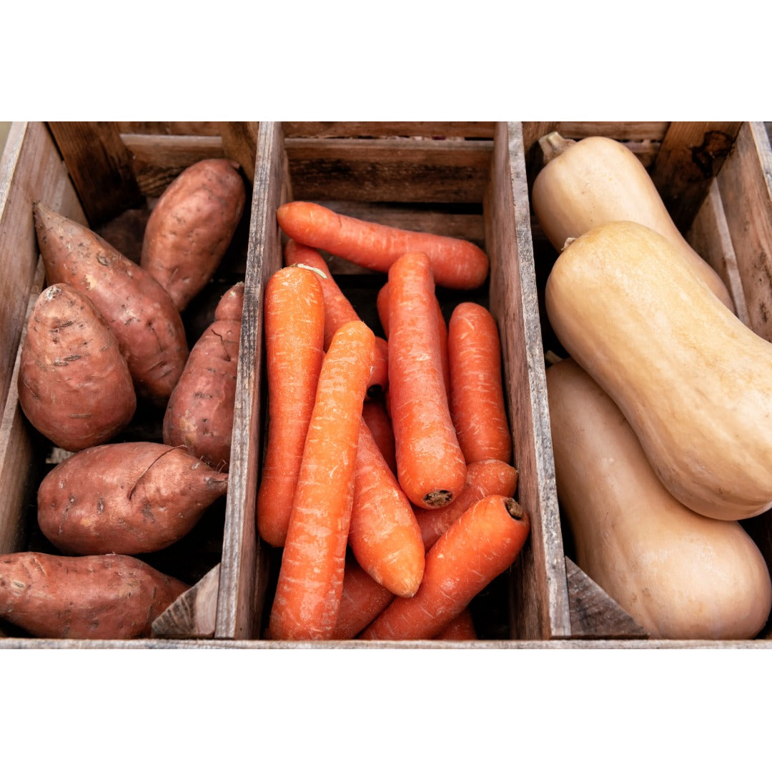 Sweet Potatoes, Carrots and Squash in bins. 