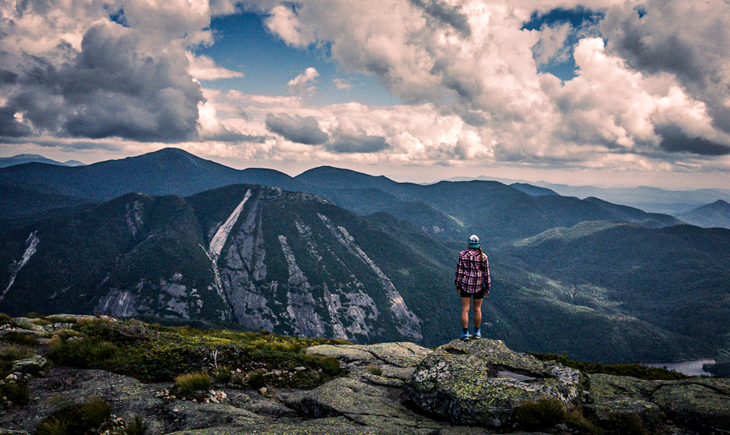 Janet Thomas Master and Elite Trainer atop Algonquin Mountain in the Adirondacks 